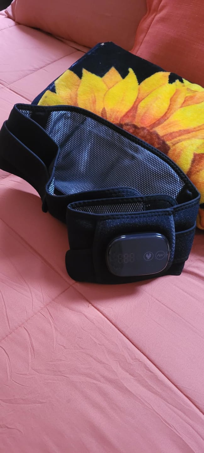 Customer photo review of Back Massage Belt – Heating Pad, Vibration & Red Light Therapy