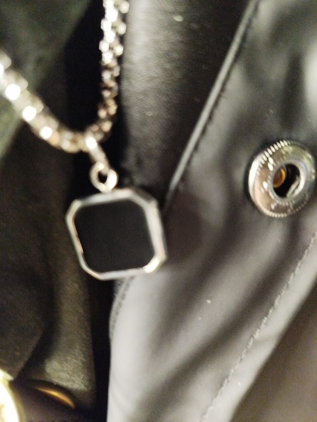 Customer photo review of THE ONYX BADGE.