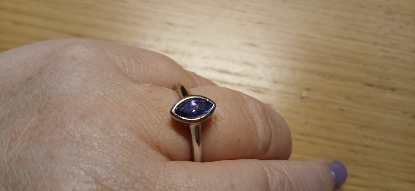 Customer photo review of Surf Moon Ring with Tanzanite