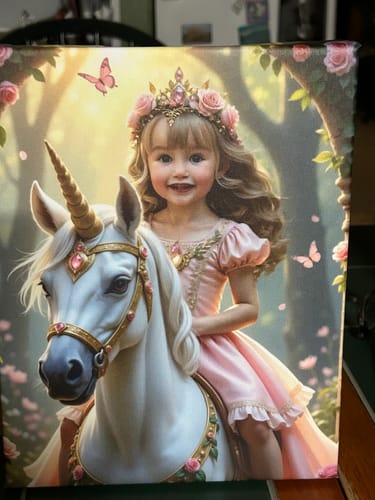 Customer's Enchanted Unicorn Princess canvas print showing a girl in a pink dress and crown riding a beautiful white unicorn.