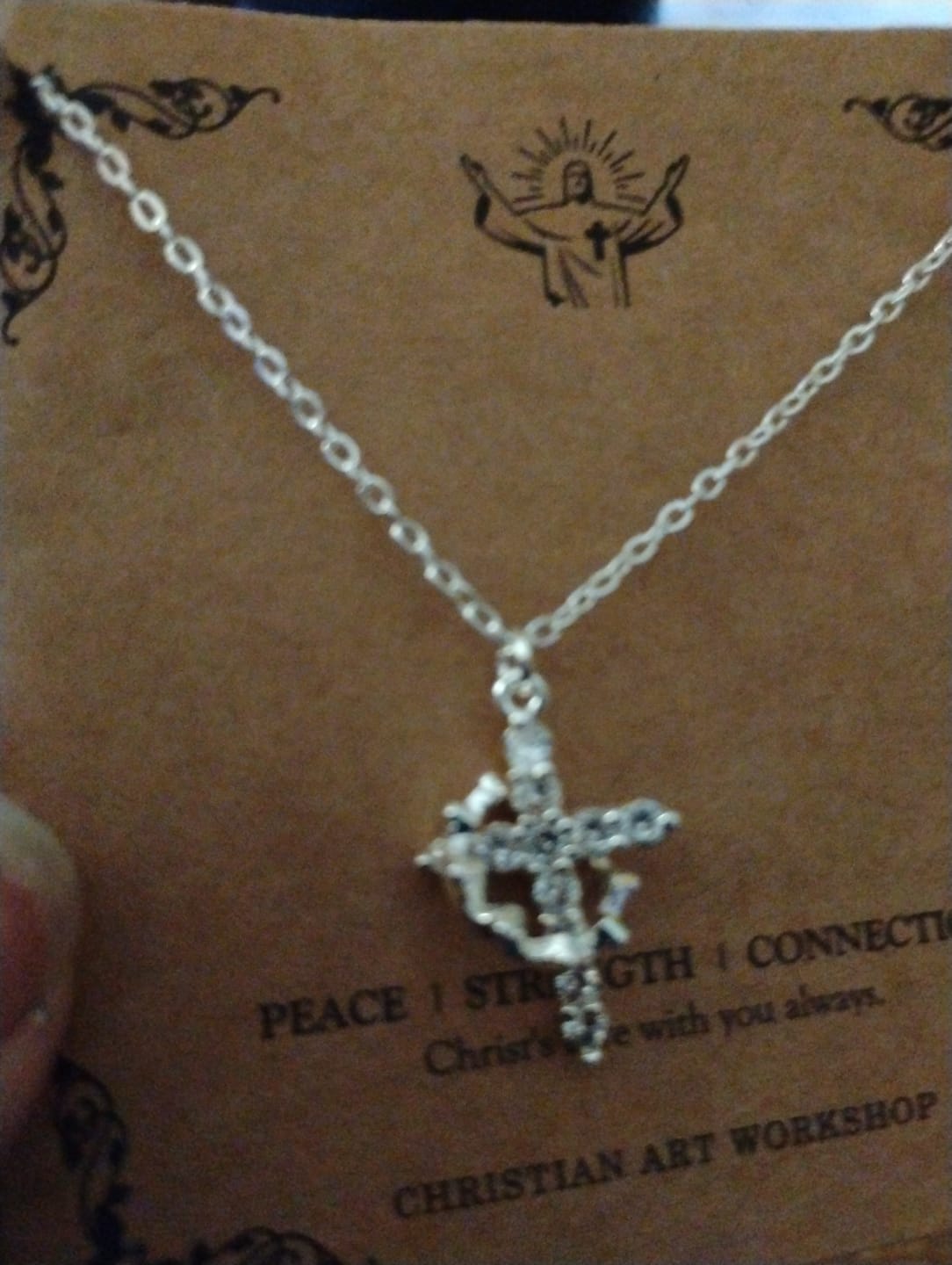 Customer photo review of Christianartworkshop Modern Crowned in Faith Cross Necklace, Earrings