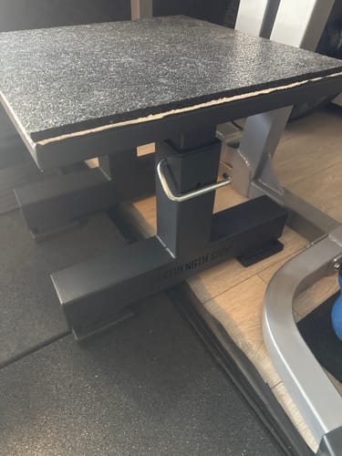 Customer's black Adjustable Plyo/Squat Box with a custom grey mat placed on the top surface.