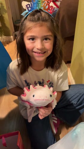 Customer photo review of Leucistic Pink Axolotl Plush – Soft, Adorably Lifelike, and Perfect for Nature Lovers