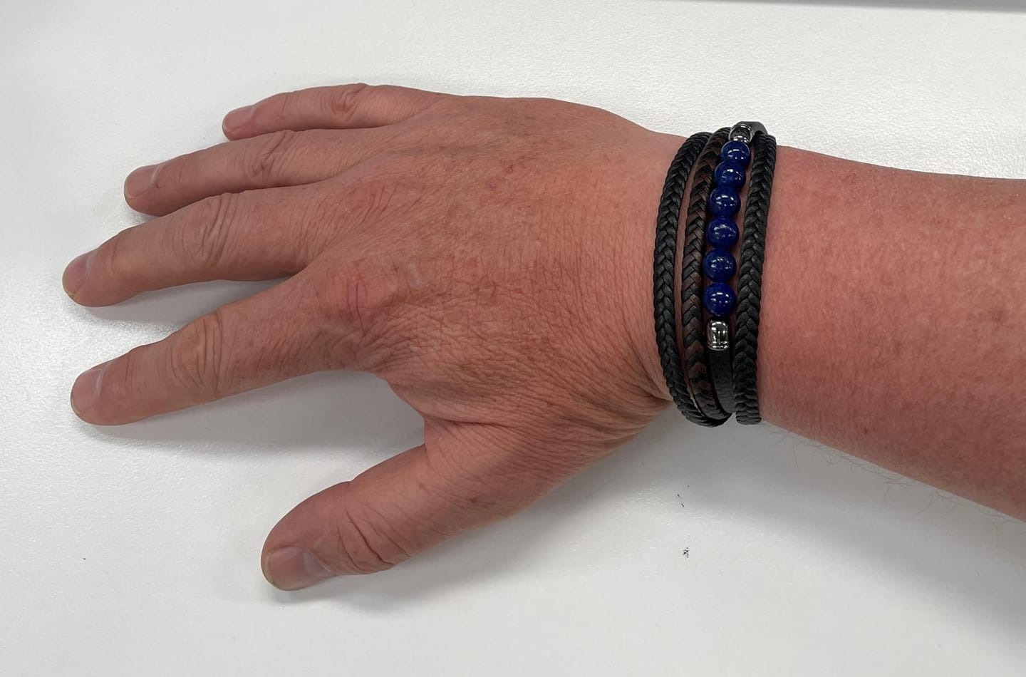 Customer photo review of Buddha Stones Tiger Eye Lava Rock Black Onyx Lazurite Hematite Bead Positive Leather Bracelet