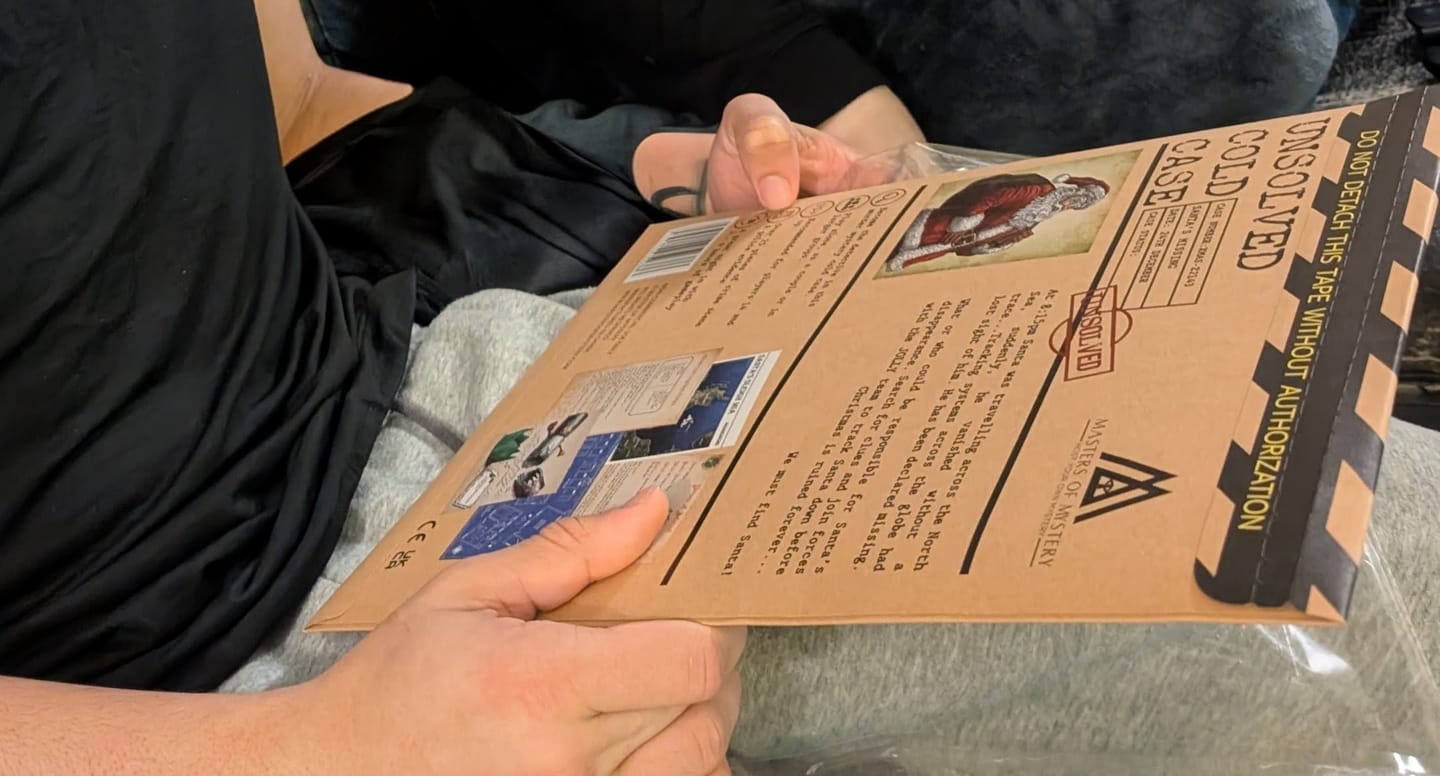 Customer photo review of Unsolved Christmas Murder Mystery Cold Case Files Game - Where Is Santa