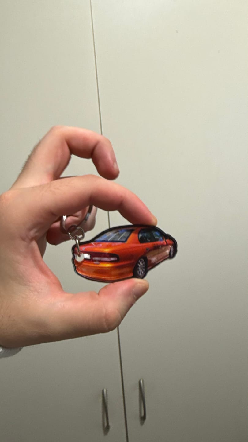Customer photo review of PG Mini Custom Keychain