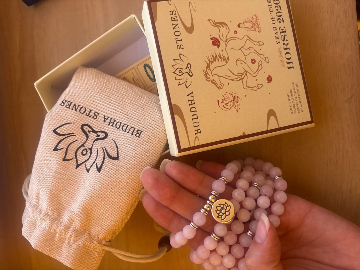 Customer photo review of Buddha Stones 108 Mala Beads Natural Stone Rose Quartz Lotus Peace Bracelet