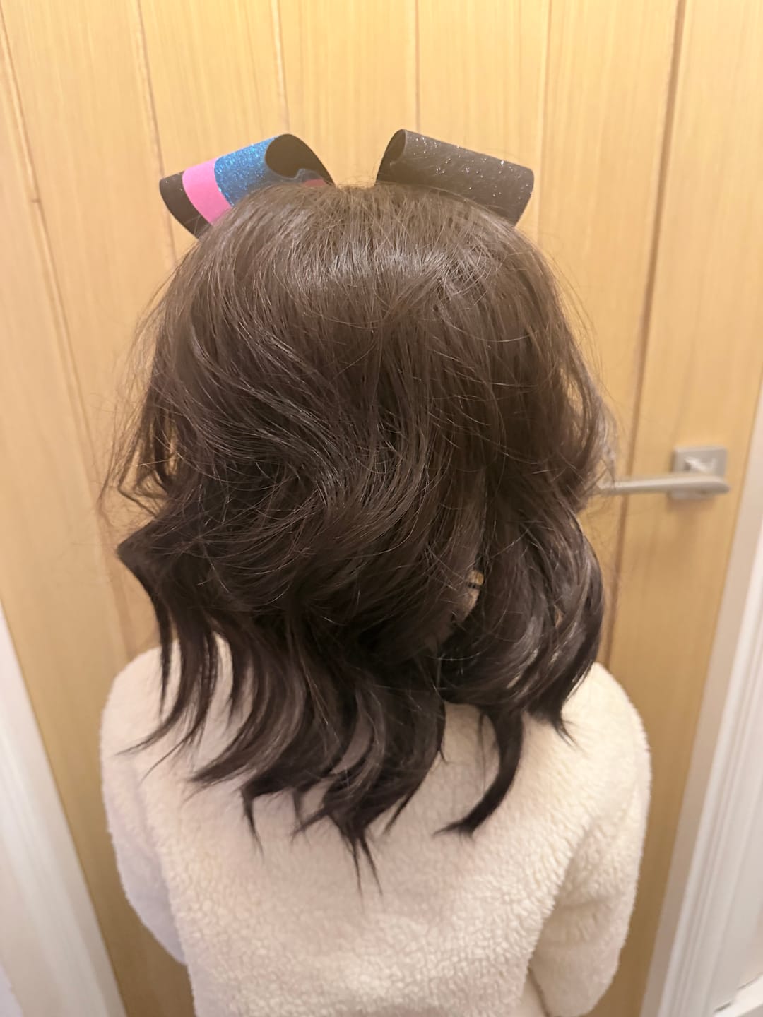 Customer photo review of Stranded Medium Wand Wave Clip-in Ponytail - Colour #2 Nigella