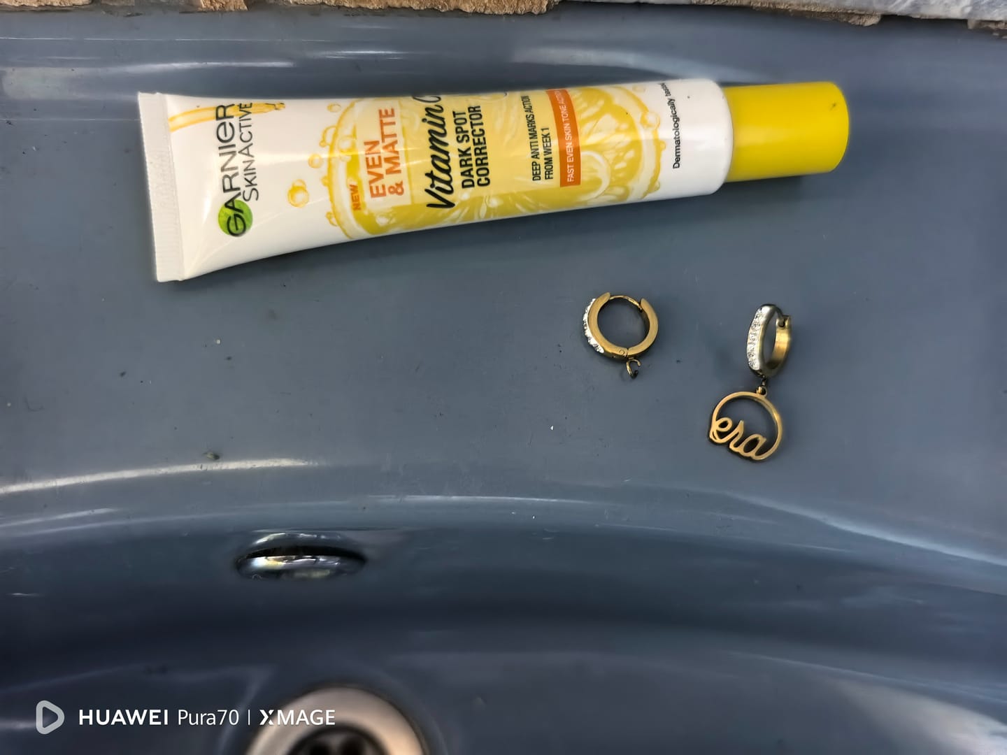 Customer photo review of Gold Precious Logo Earrings
