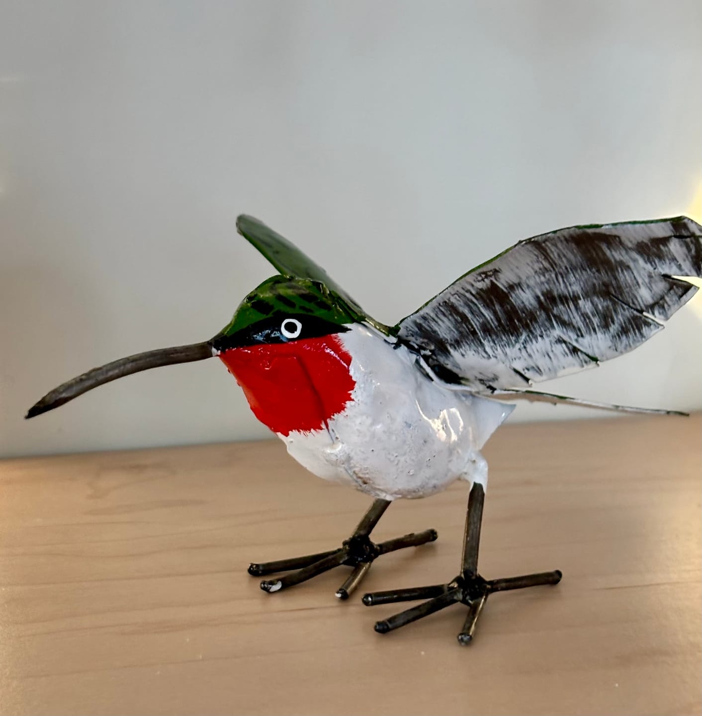 Customer photo review of Ruby Throated Hummingbird Recycled Metal Sculpture