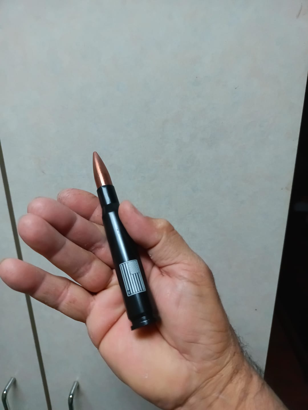 Customer photo review of .50 Cal Bullet Bottle Opener