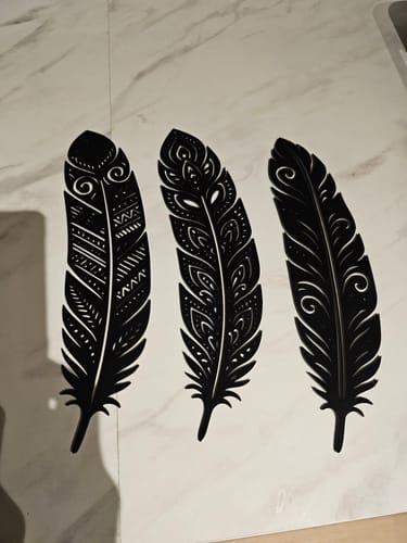 Customer photo review of Detailed Huia Feather Trio