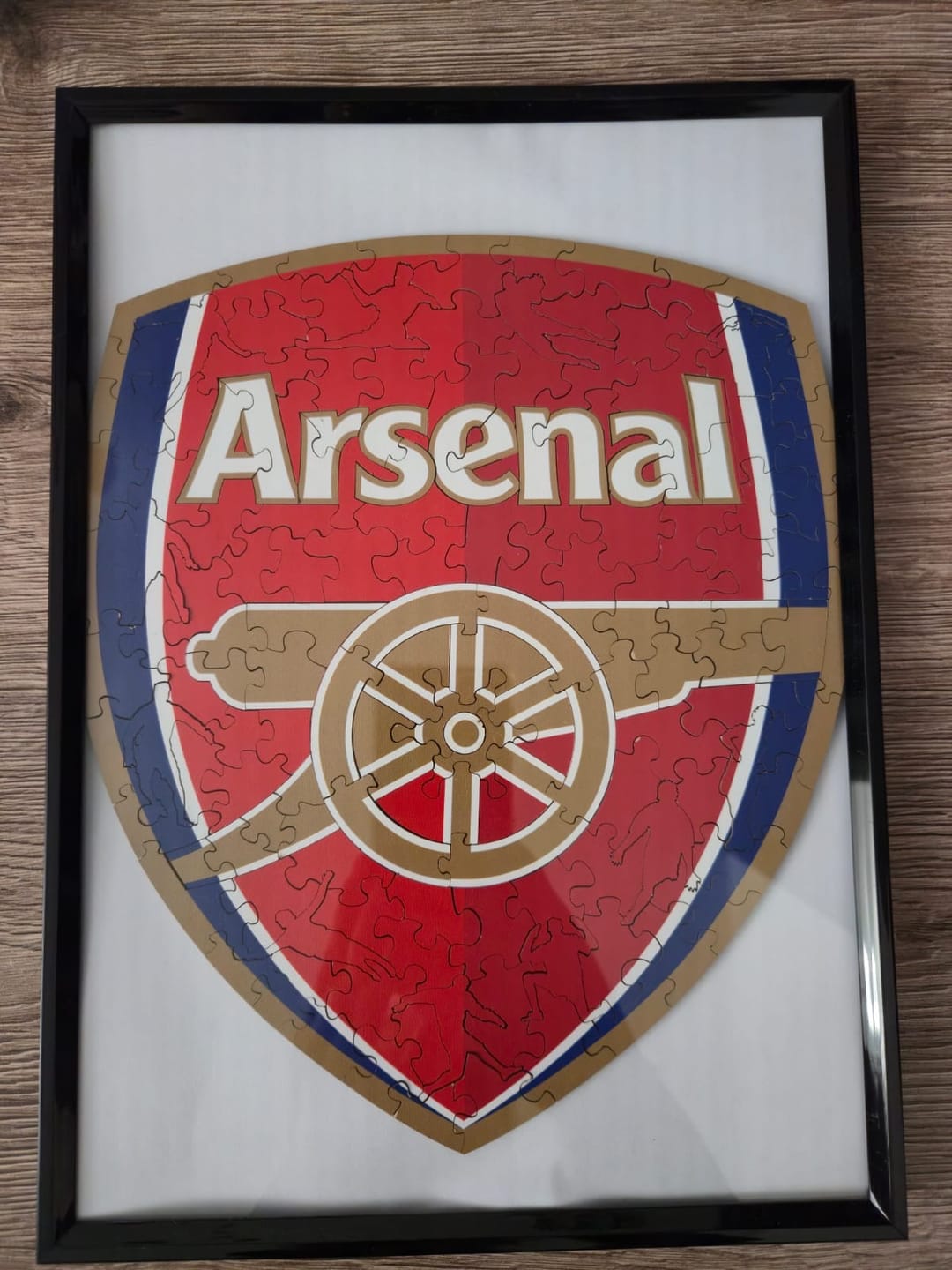 Customer photo review of Arsenal FC® Logo - Wooden Puzzle