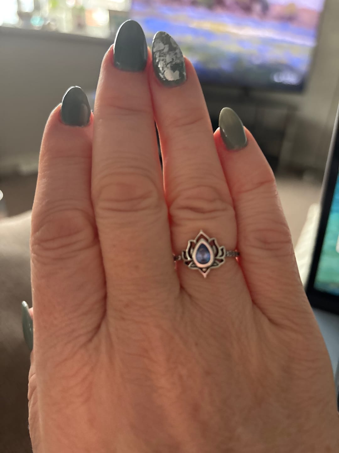 Customer photo review of Buddha Stones Sterling Silver Lotus Zircon Blessing Protection Ring