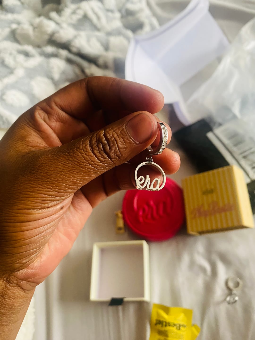 Customer photo review of Silver Precious Logo Earrings