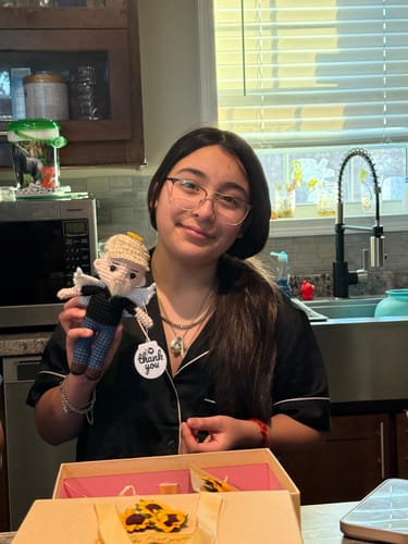 Customer photo review of Dolly® Personalized Crochet Doll with Photo Card