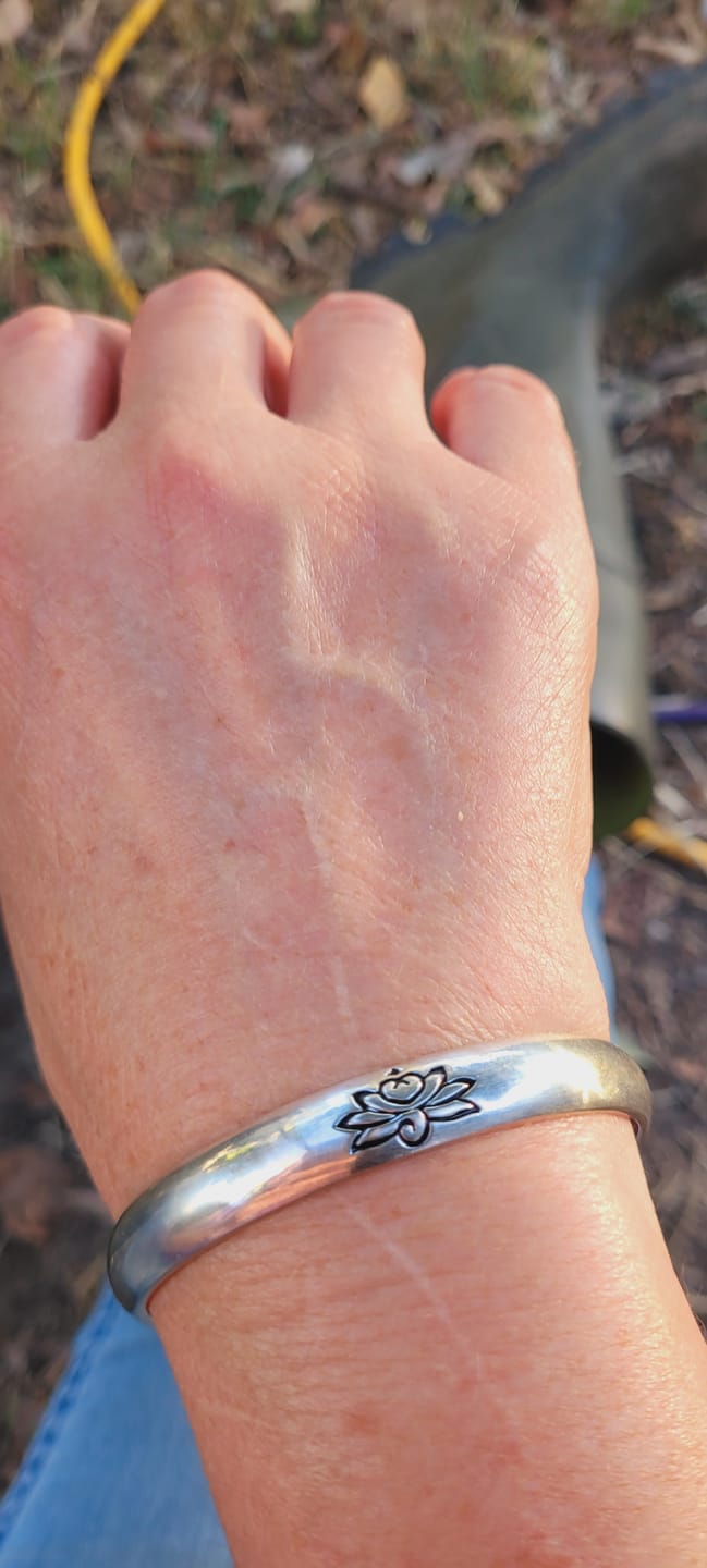 Customer photo review of Buddha Stones Lotus Flower Heart Sutra White Copper Healing Luck Bracelet