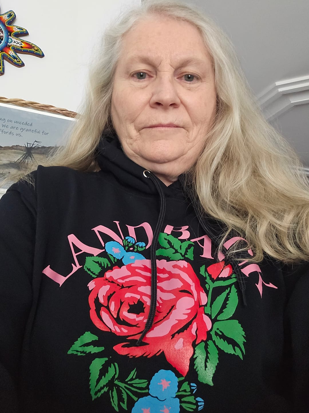 Customer photo review of Rose Land Back Hoodie