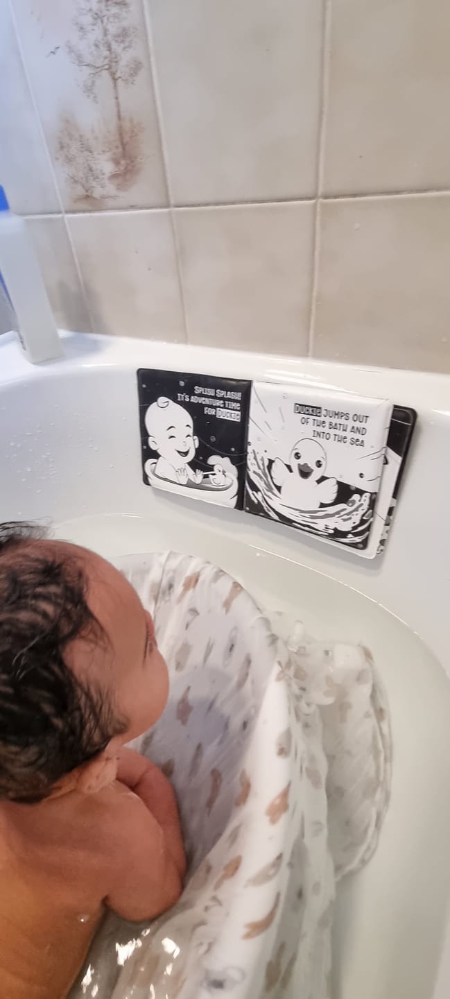 Customer photo review of Duckie Goes On An Adventure Black and White Bath Book