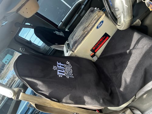 Customer's black Waterproof Car Towel Seat Covers fitted onto the front seats of an F250 truck.