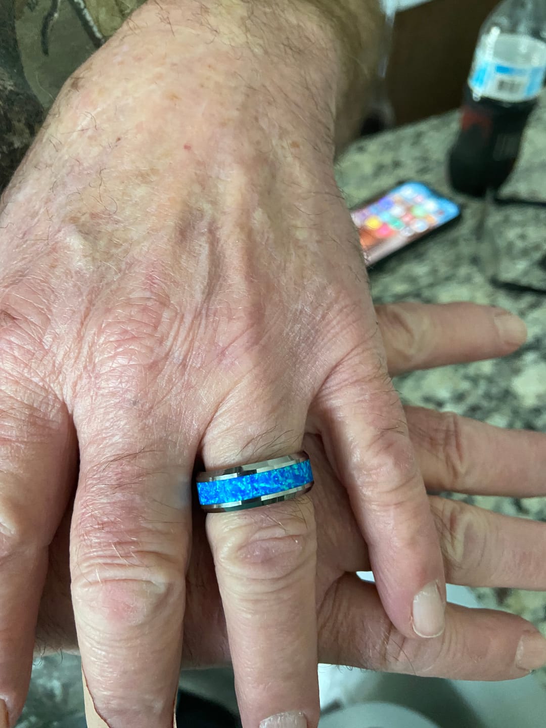 Customer photo review of 8mm Silver Tungsten Carbide Wedding Band With Blue Opal Inlay