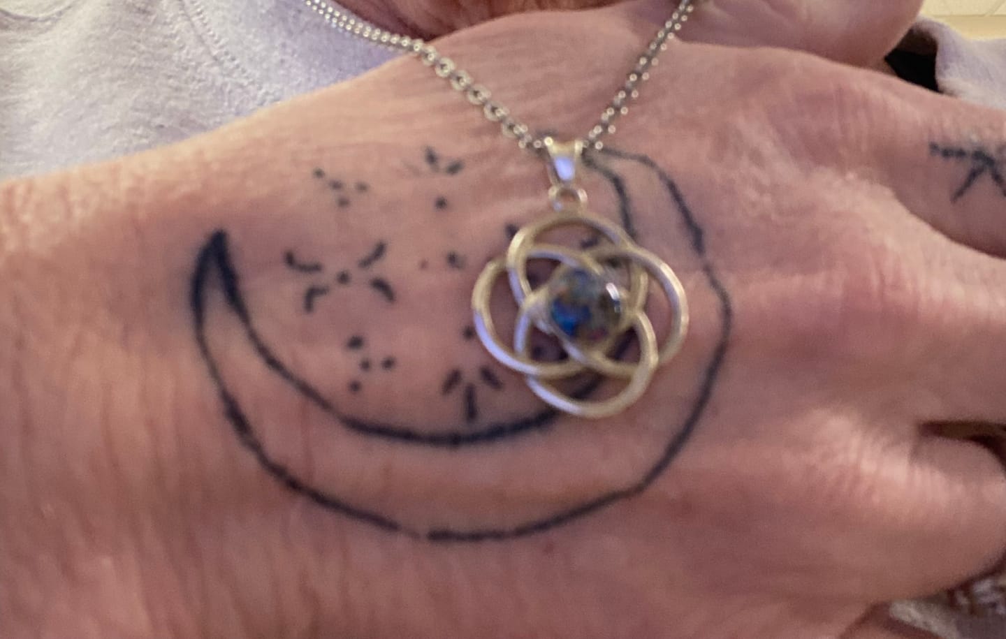 Customer photo review of Celtic Spiral Pendant with Cremation Ashes