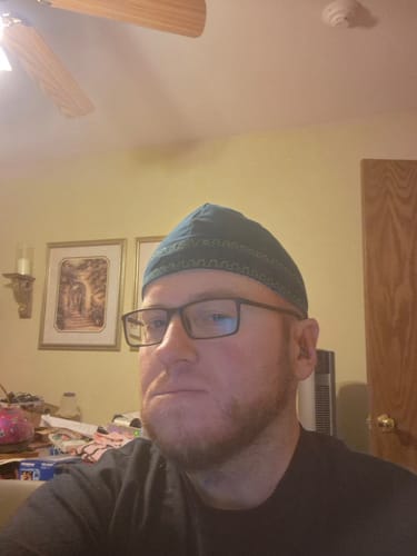 Customer selfie provided for an X30i Earplugs review.