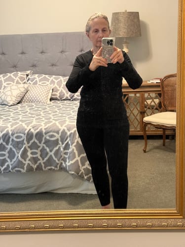 Customer showing the full-length fit of the black Stella Petite leggings in a mirror selfie.