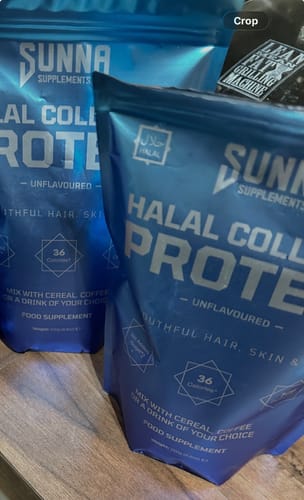 Customer's two blue pouches of Halal Collagen Protein sitting on a wooden surface.