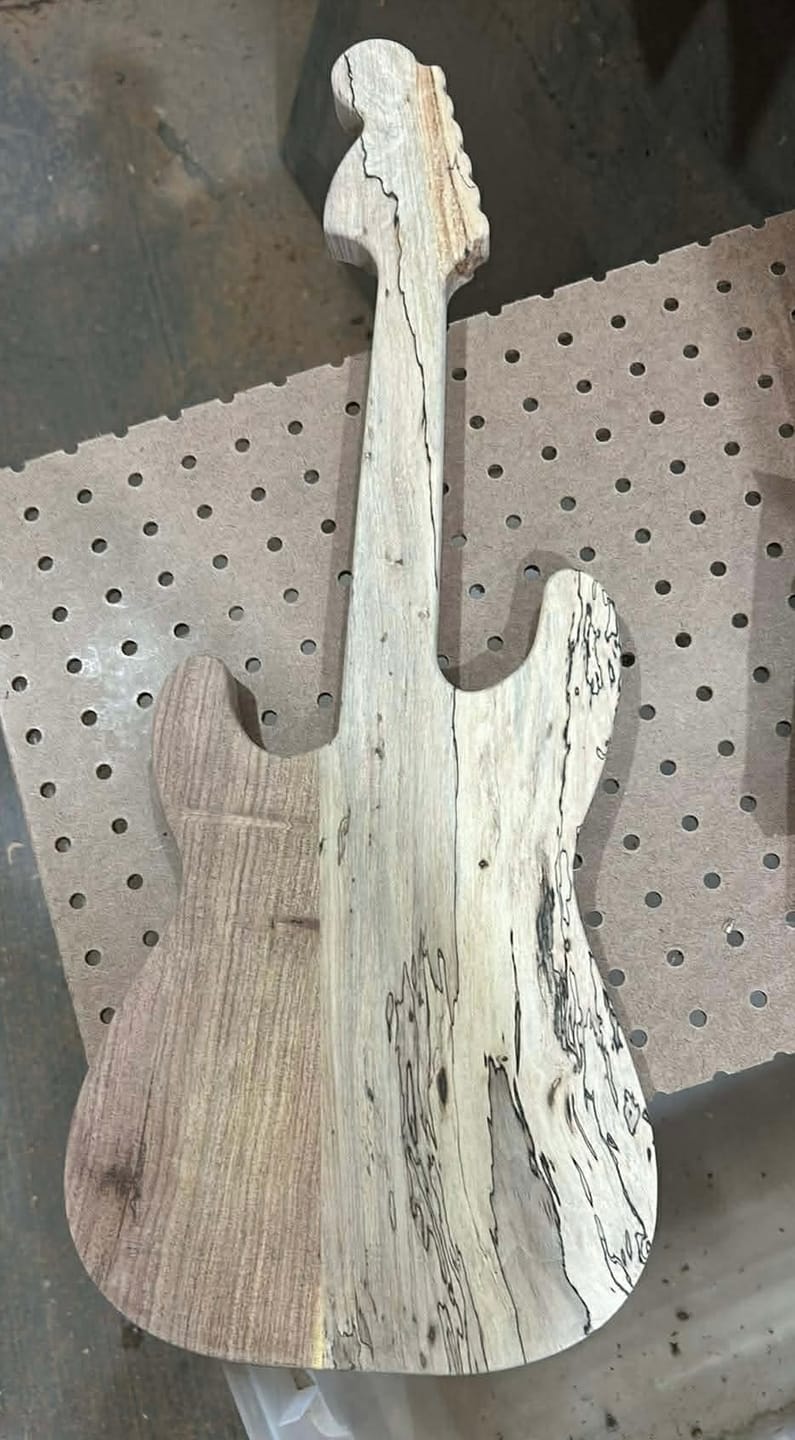 Customer photo review of 23.0x9.0" Stratocaster Guitar Serving Board Acrylic Router Template