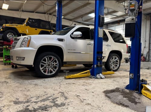 Customer photo review of 2007-2013 Cadillac Escalade, Escalade ESV, EXT 4-Wheel Air Suspension Conversion Kit / Delete Kit With Camber Bolts and Suspension Light Module (GC24FMCK1)