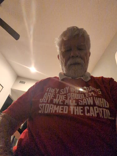 Customer photo review of They say immigrants are the problem. But we all saw who stormed the Capitol Unisex Tee LIMITED EDITION (Gold)