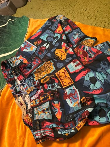 Customer's Lilo & Stitch "Tiki-terrestrial" Hybrid Shorts laid out, showing the colorful character print.
