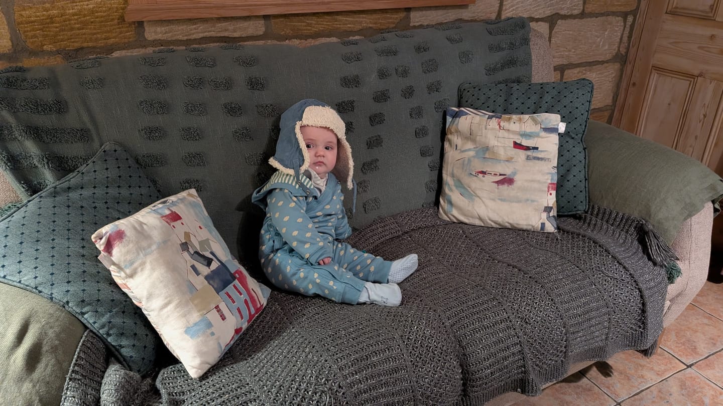 Customer photo review of Fluffy Cloud Reversible Hooded Snug As A Bug Suit