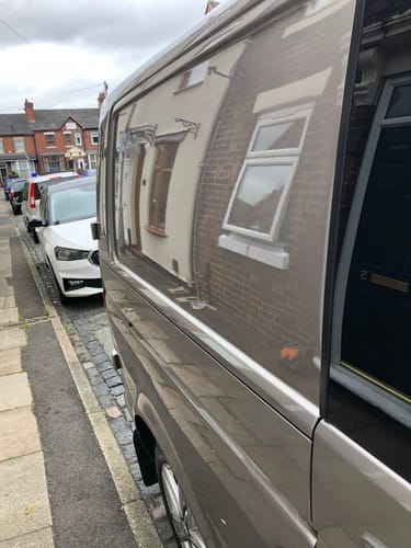 Customer's photo of a shiny van with a mirror-like finish after using the Liquid Ceramic Shampoo.