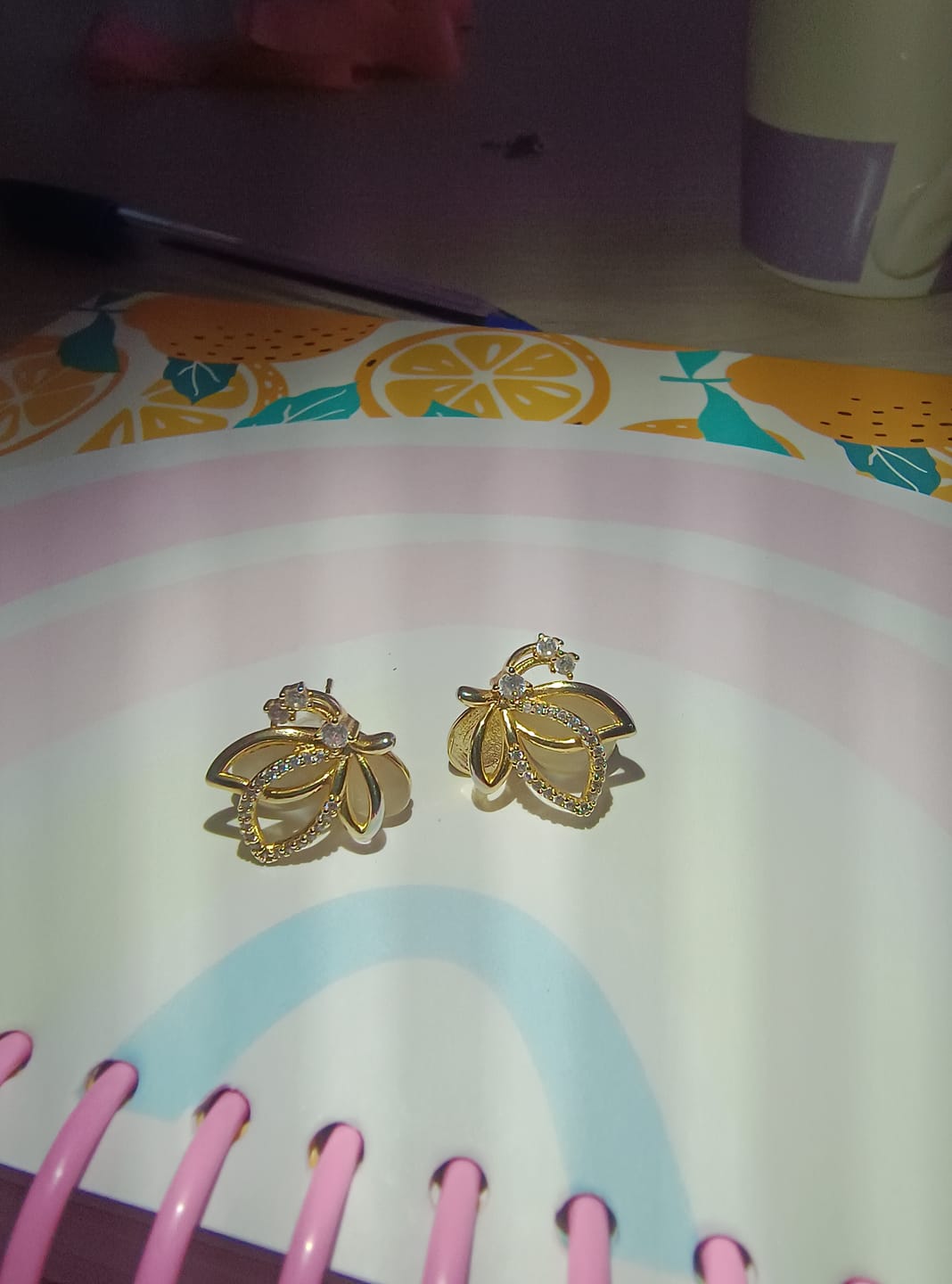 Customer photo review of Aretes Butterfly Gold