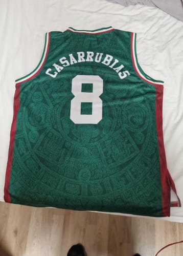 Customer's green Mexico Heritage Custom Basketball Jersey showing the back with the custom name 'CASARRUBIAS' and number '8'.