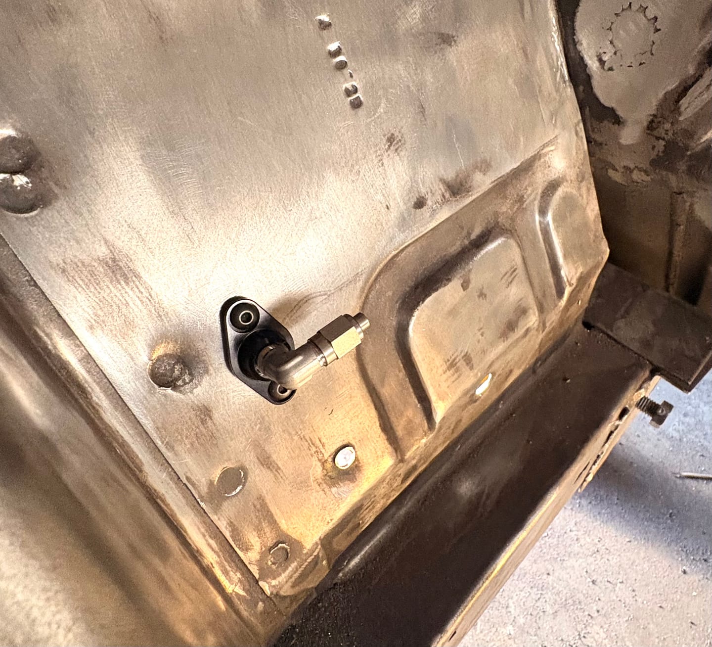 Customer photo review of 1/8" NPT Bulkhead Flanged Pass Thru Fitting by Motion Raceworks