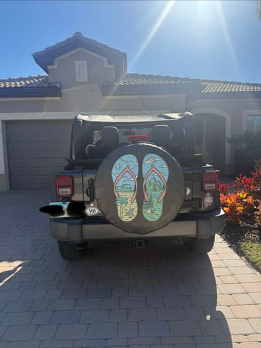 Customer photo review of Beach and Mountain Flip Flop Spare Tire Cover for Jeep, Bronco, RV, Camper, & More