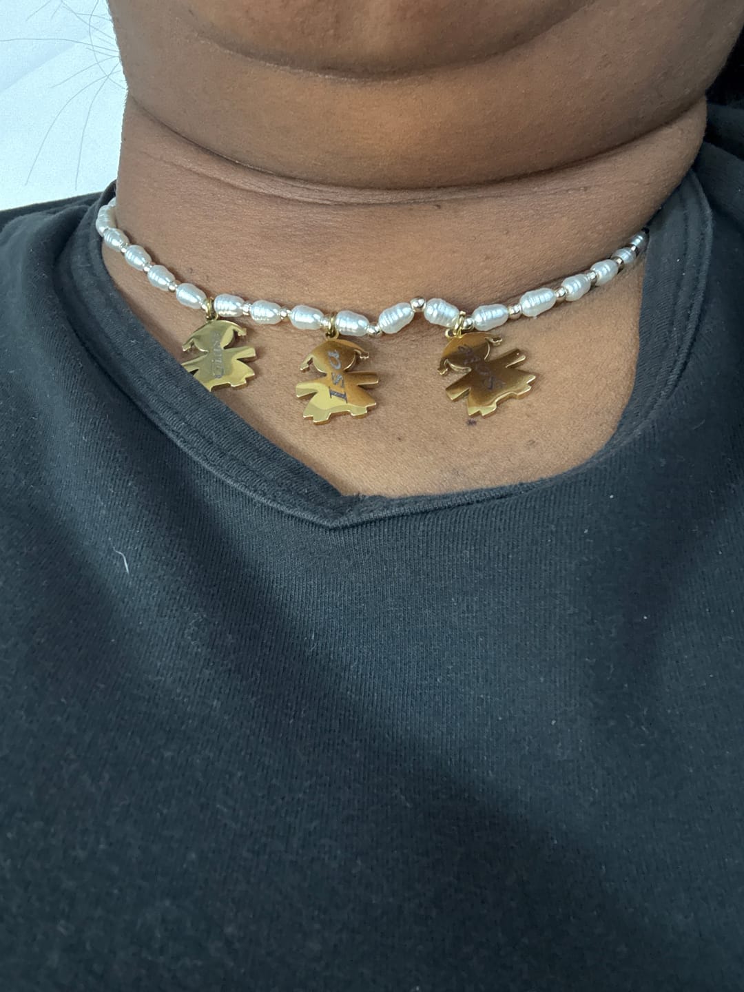 Customer photo review of Girocollo perline con bambini e incisione