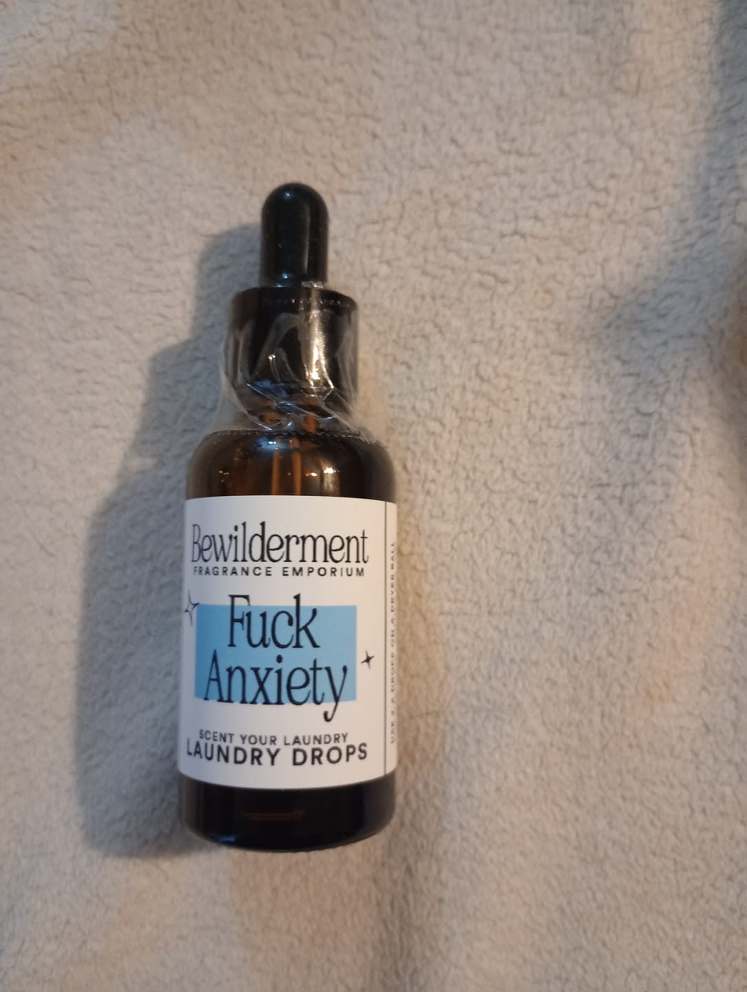 Customer photo review of Fuck Anxiety Laundry Drops
