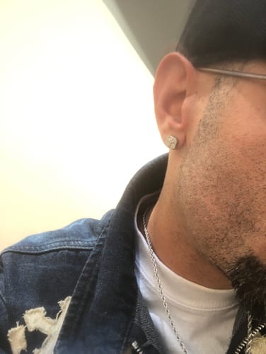 Customer photo review of MOISSANITE SQUARE CROSS STUDS.