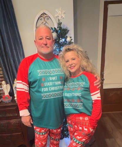 Reviewers wearing their matching Kelly Green and Red Raglan Long Sleeve T-shirts as customized Christmas pajama tops.