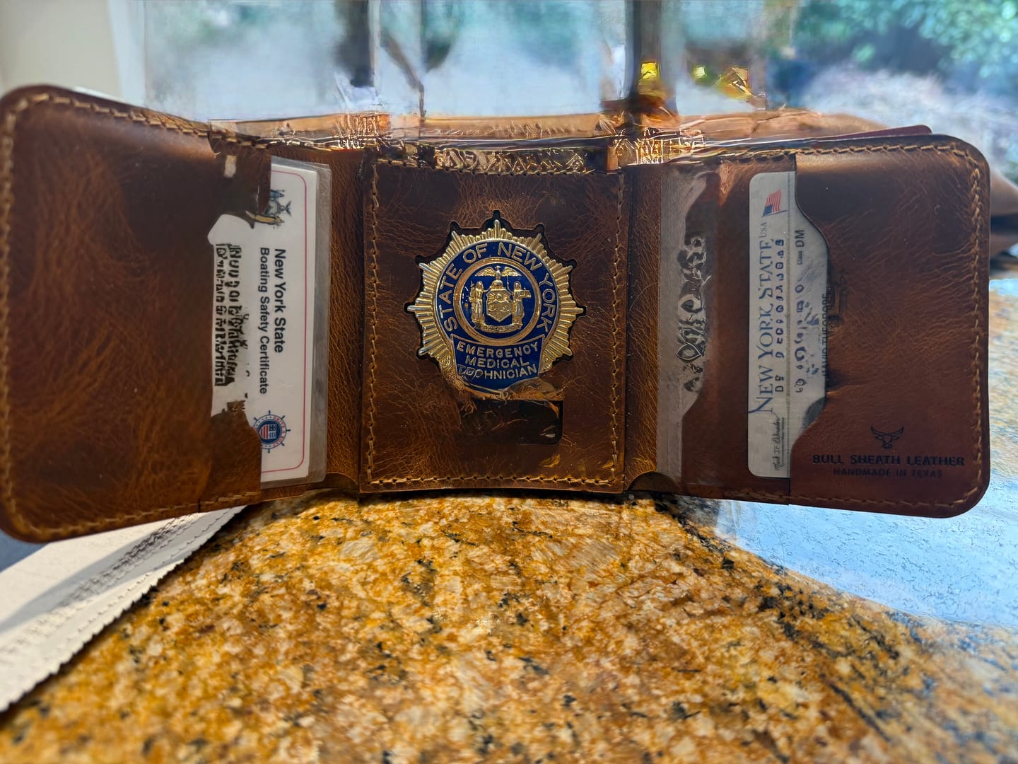 Customer photo review of Badge Trifold Wallet