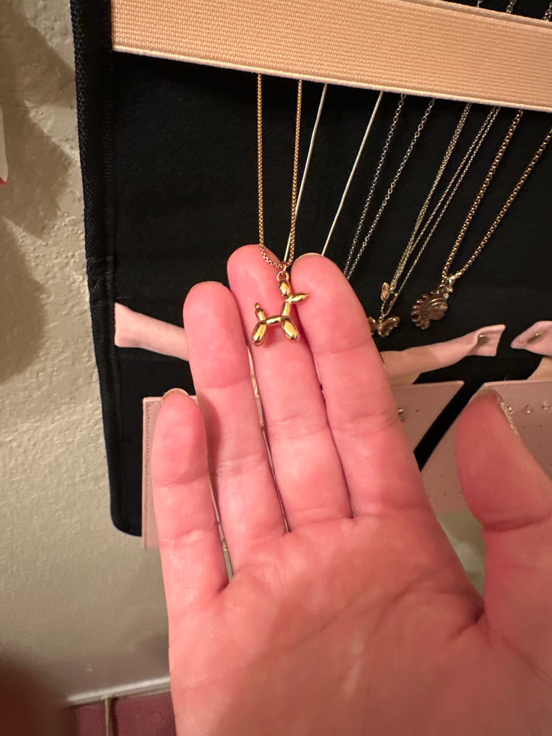 Customer photo review of Gold Balloon Animal Necklace