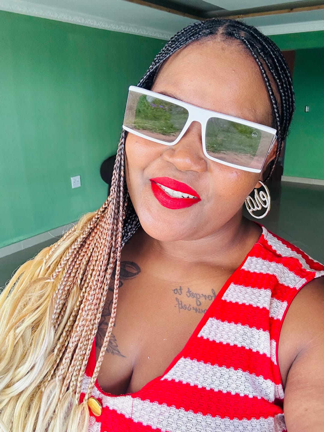 Customer photo review of Gold Luxe Logo Hoops