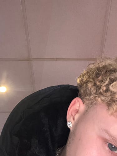 Customer photo review of MOISSANITE HALO EARRINGS.