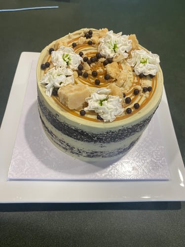 Customer photo review of chocolate caramel cake