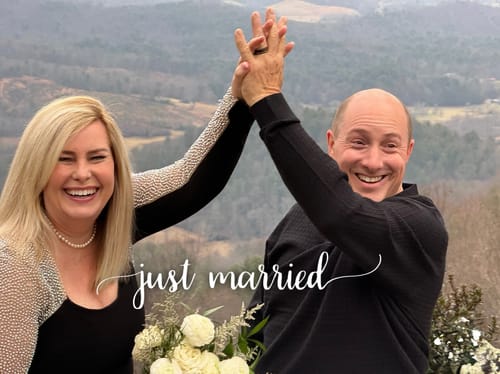 A happy customer and partner celebrate getting married, showing off his Thorum wedding band.