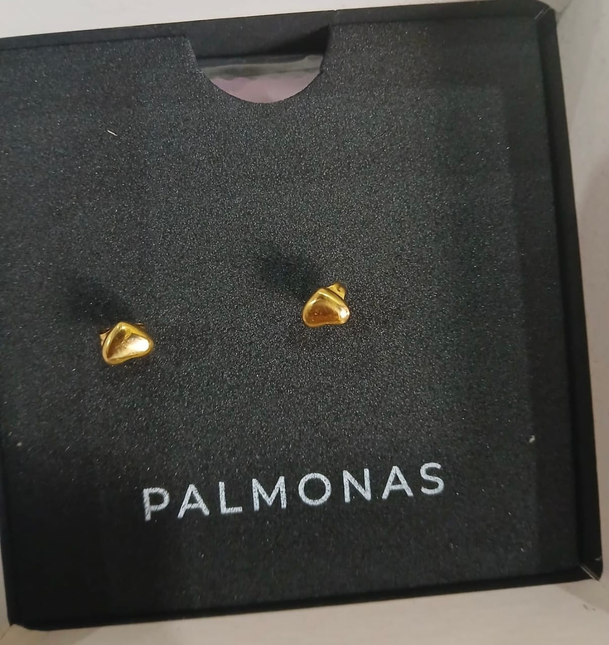 Customer photo review of Minimalist Heart Stud Earrings